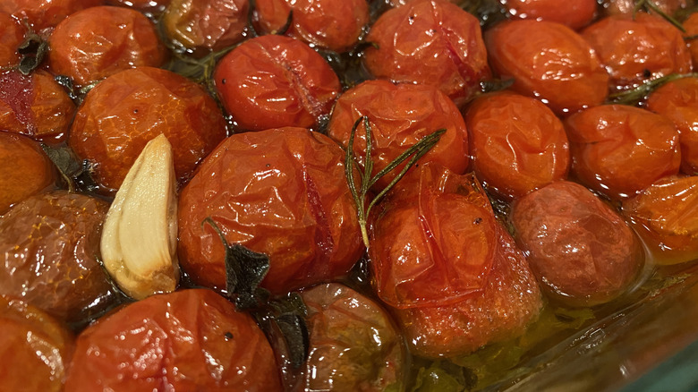 Close-up of tomato confit in a roaster pan