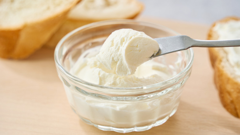 Cream cheese spread on bread slices