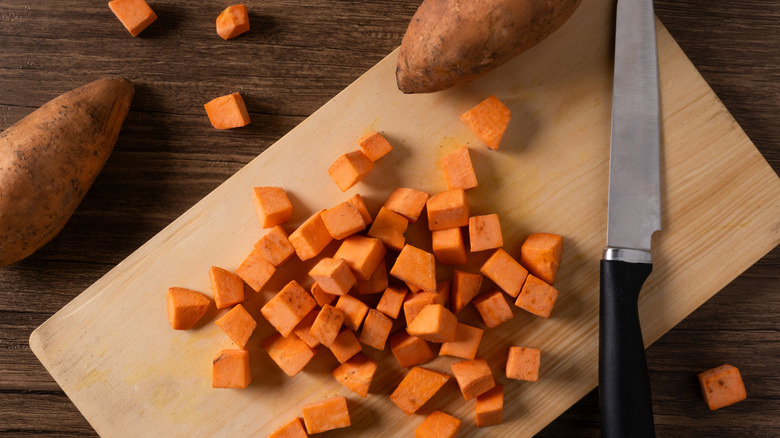 diced sweet potato on a cutting board