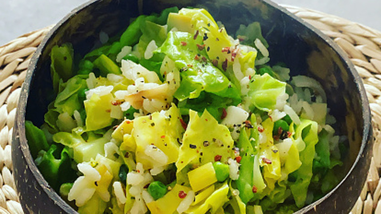 Cabbage and rice in a coconut bowl
