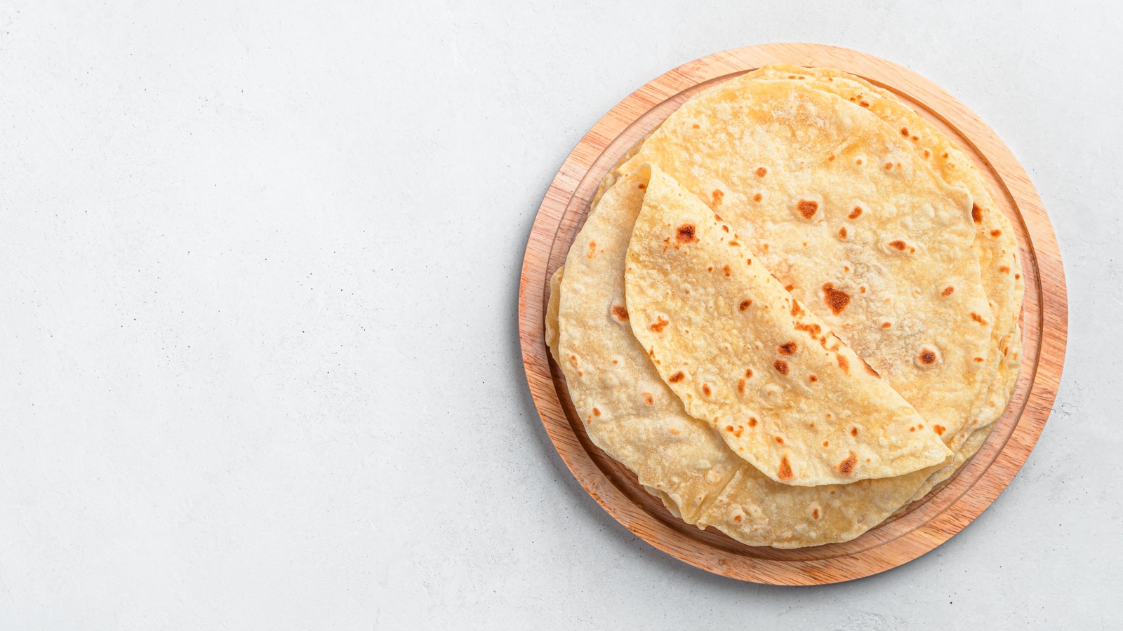 For Shortcut Puri, All You Need Is StoreBought Tortillas (& A Lot Of Oil)