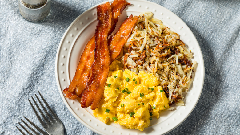 Hash brown with bacon and scrambled eggs