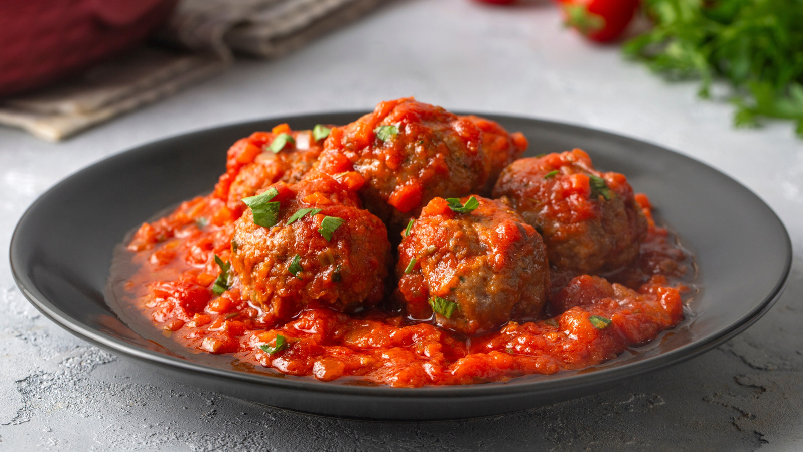 For The Best Meatballs You've Ever Tasted, Fold This Bold Ingredient Into The Mix - Tasting Table