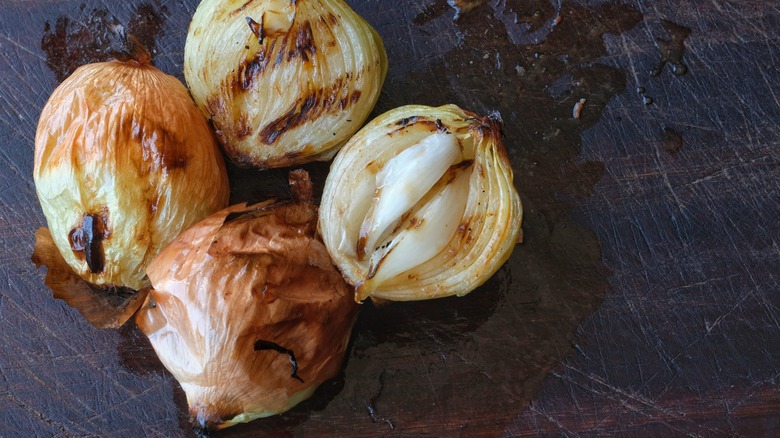 charred caramelized halves of onions