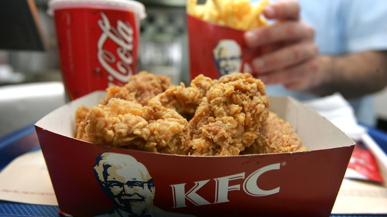 KFC chicken with a side of French fries