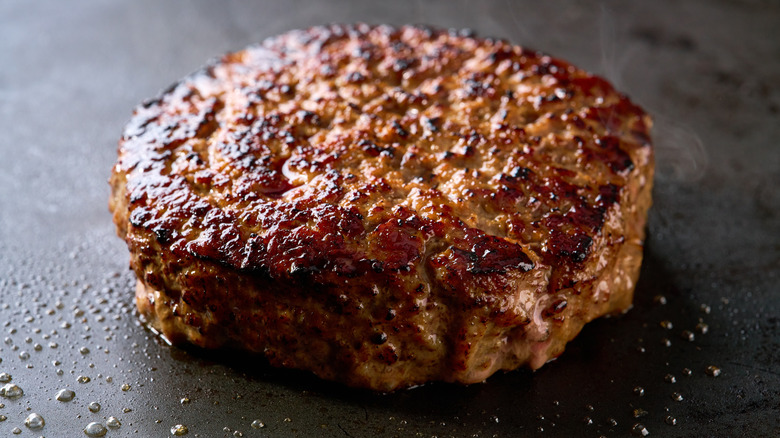juicy burger on a flat top