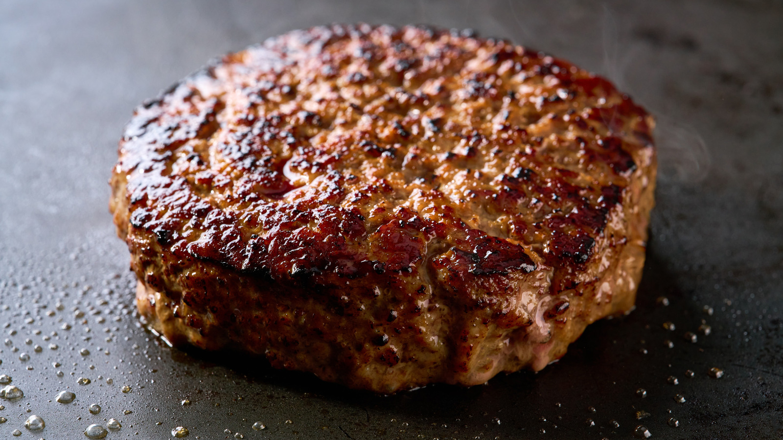 For The Juiciest Burgers You've Tasted, Add A Quarter Cup Of This To Your Mixture (It's Heavenly)