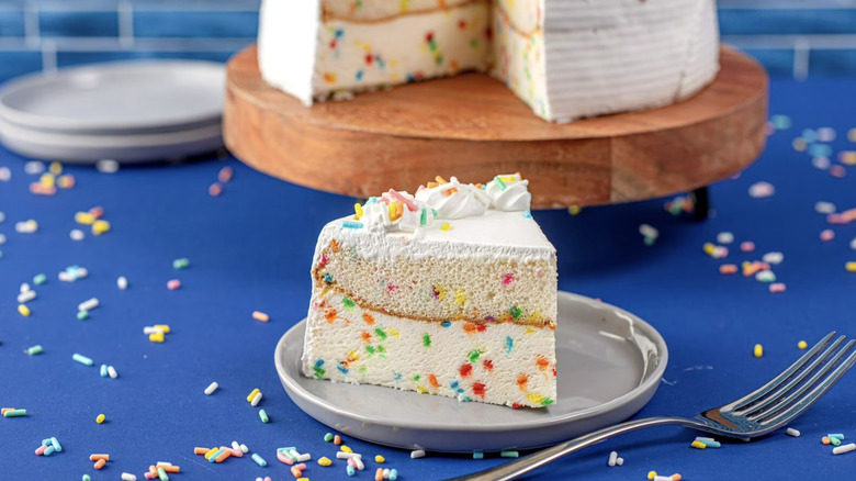 Walmart's Funfetti ice cream cake on a table beside a fork