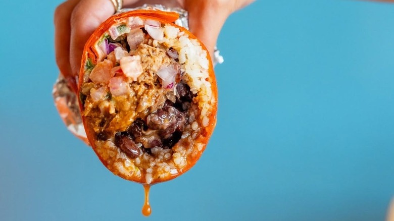 A product shot of a burrito from Freebirds World Burrito