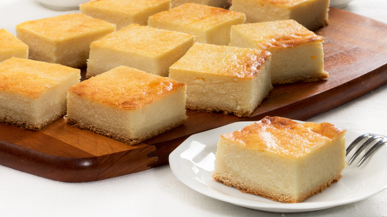 squares of cheesecake on tray