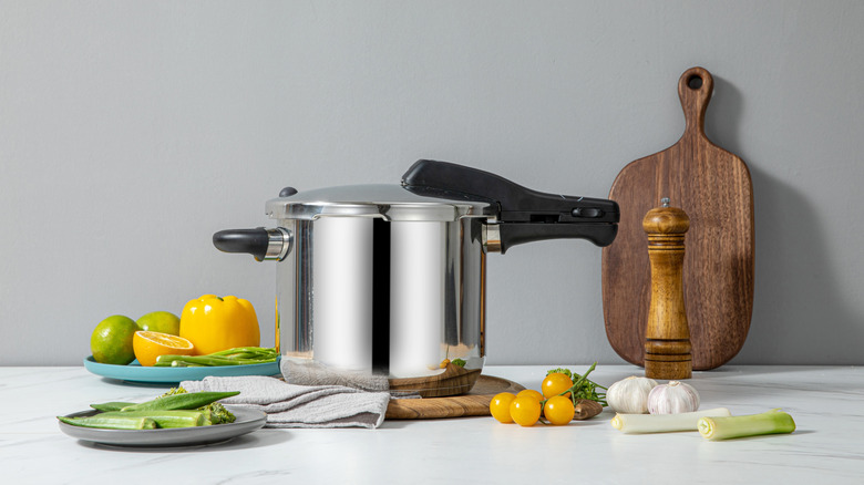 A pressure cooker with other kitchen props