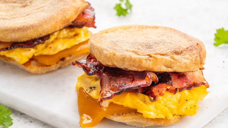 egg bacon and cheese breakfast sandwiches on a plate
