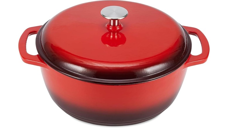 A red Amazon Basics Enameled Cast Iron Dutch Oven