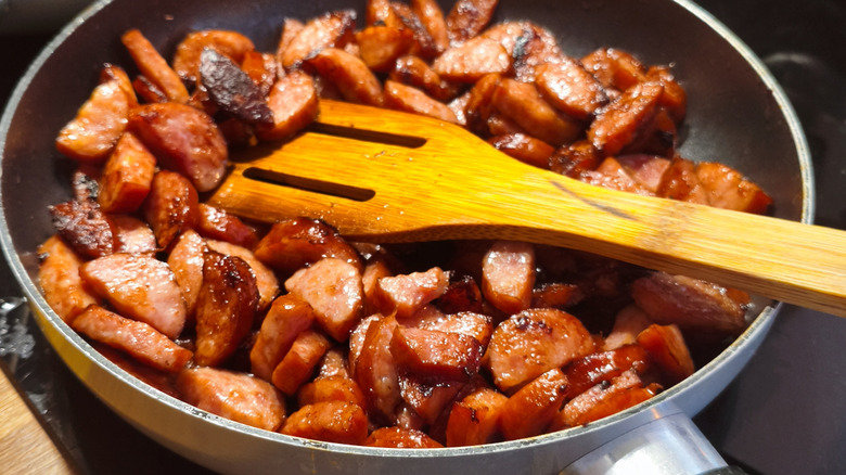 Sizzling pan of homemade candied kielbasa