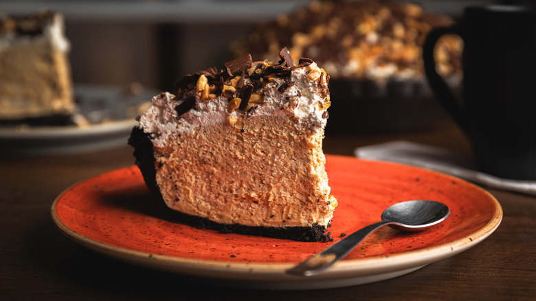 A slice of peanut butter pie with Oreo crust