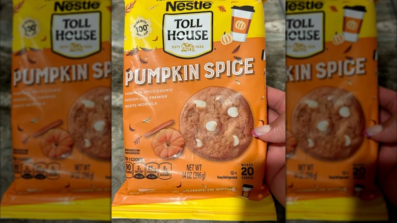 Hand holding package of Nestle Toll House Pumpkin Spice Cookies