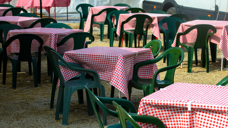 Tablecloths with chairs outside