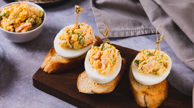 Deviled eggs on toasted baguette slices