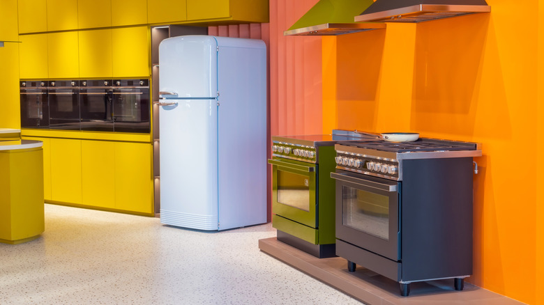 Colorful appliances in a modern kitchen showroom