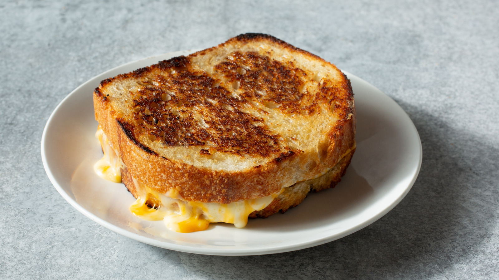 Forget Tomato Soup: Give Grilled Cheese A Smoky Flavor By Dunking It In This Sauce