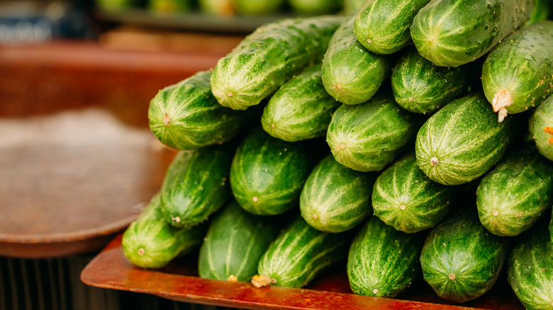 End view of pile of homegrown cucumbers