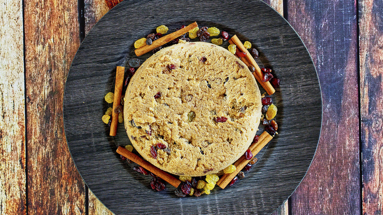 Pudding from above on a plate and wooden table