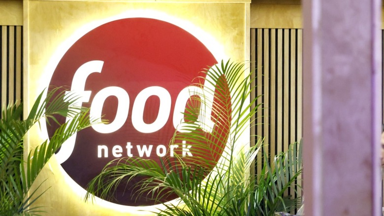 Food network logo with plants in front of it