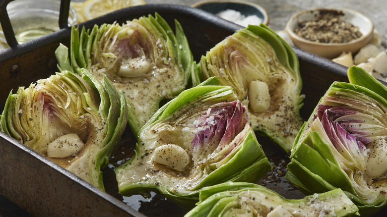 preparing artichokes with garlic