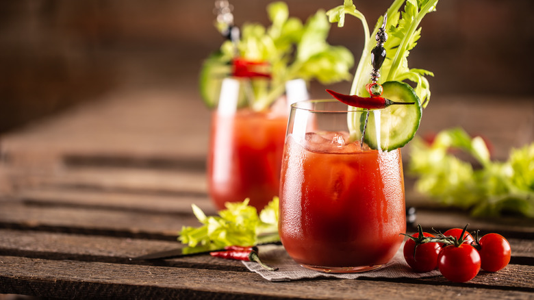 Two bloody marys with garnishes