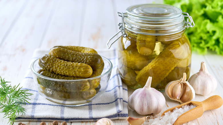 Pickles in a jar and a bowl
