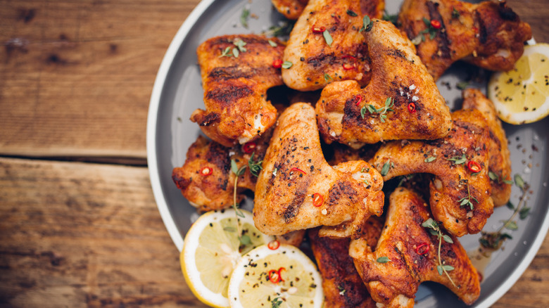 chicken wings garnished with herbs