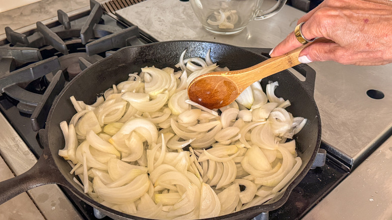 Sliced onions in skillet