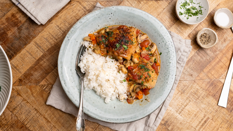 French-style chicken chasseur serving