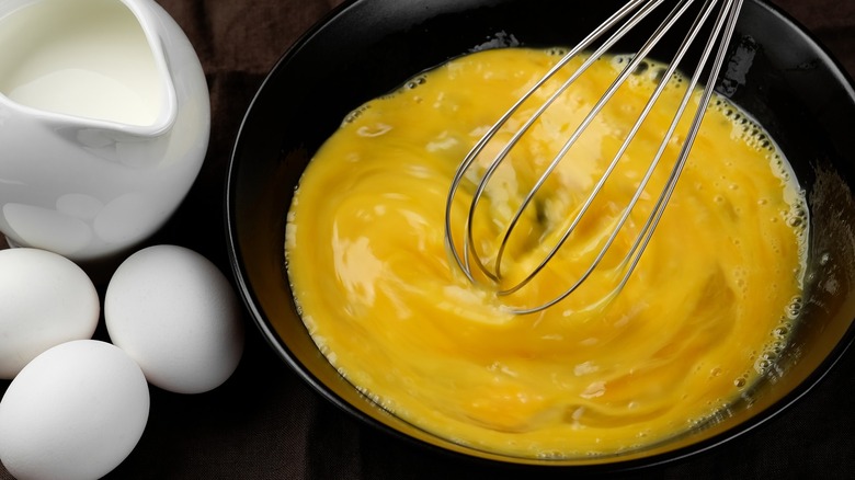 Whisking eggs in a bowl