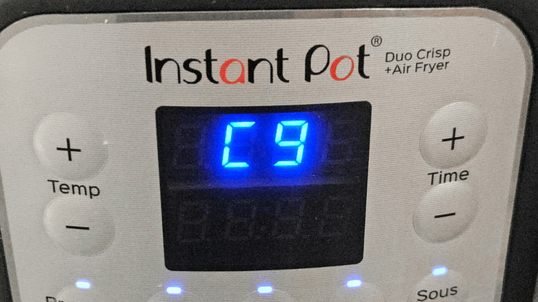A close-up of an Instant Pot screen displaying the error code C9