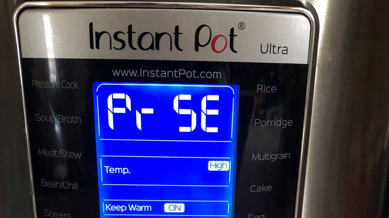 A close-up of an Instant Pot Ultra with the error code PrSE on the screen