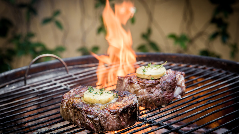 Steak on an open flame grill 