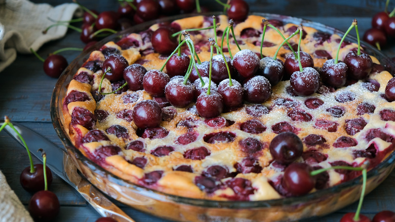 Cherry clafoutis pie in glass dish