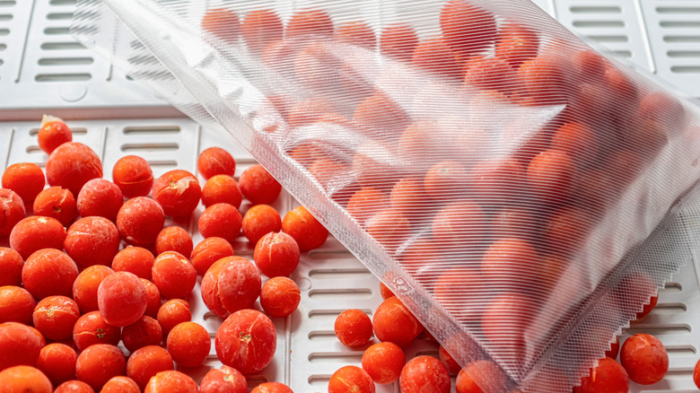 Cherry tomatoes spilling out of vacuum sealed bag