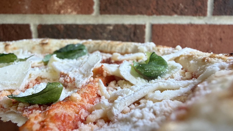 Closeup of frozen, uncooked bettergoods Margherita pizza