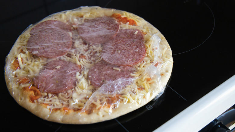 frozen pizza on stove