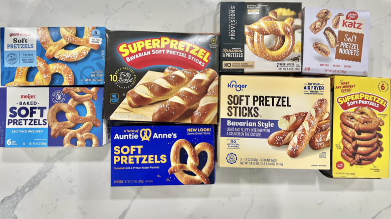 8 different kinds of frozen soft pretzels laid out.