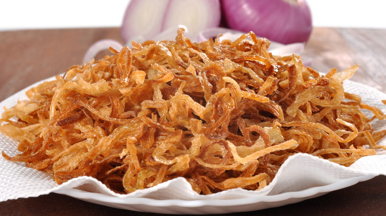 A plate of crispy fried onions