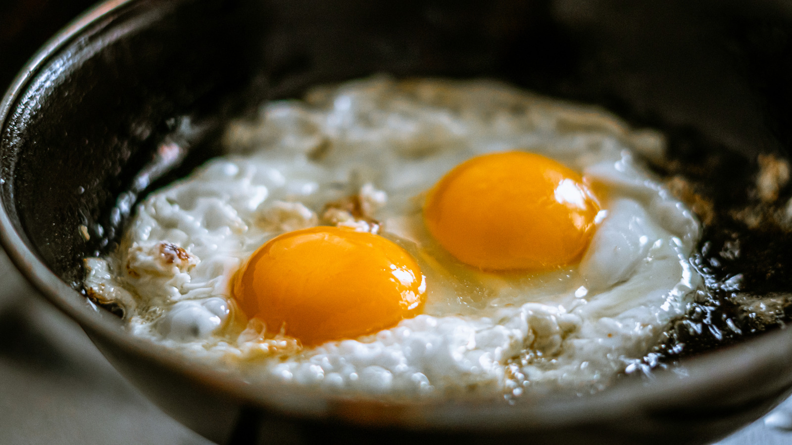 Fry Your Eggs In This Unlikely Ingredient For The Perfect Subtle Flavor Boost - Tasting Table