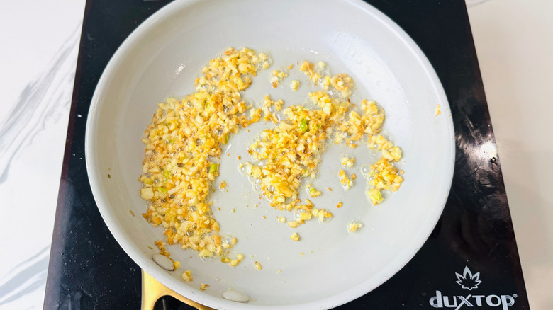 Sauteed garlic in pan