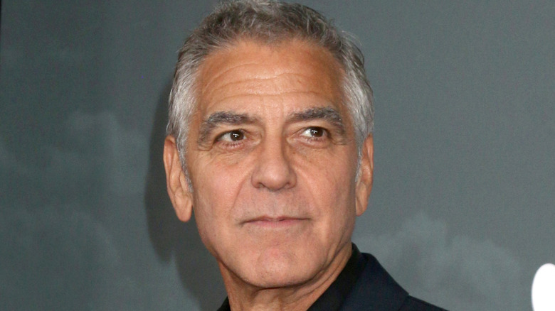 George Clooney posing at event