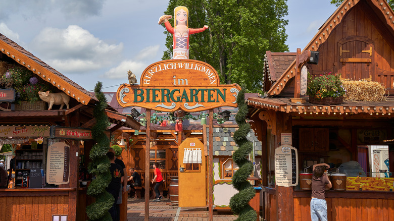 Beer garden with different stations for various foods and beverages