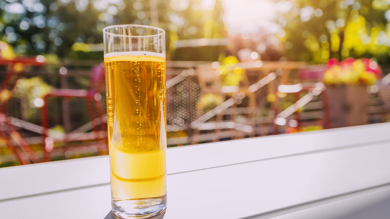 Freshly brewed malt crafted kolsch beer in outdoor bar or german biergarten
