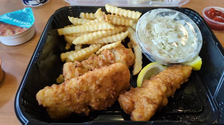 A Culver's fish dinner with fries and coleslaw.