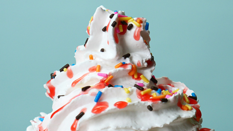 whipped cream topped with sprinkles